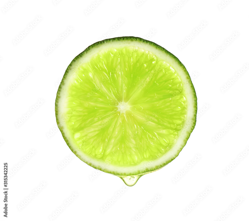 Slice of lime with dripping essential oil isolated on white Slice of lime with dripping essential oil isolated on white