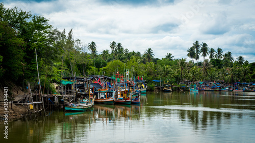 Thai fishing boats tied up to each other in the harbor of Ben Krut © David