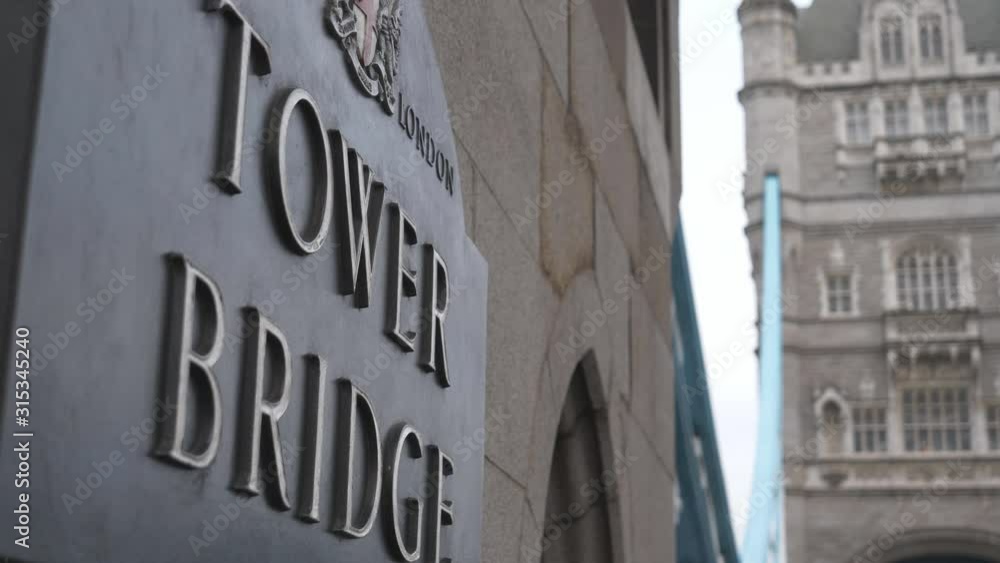 A close up view of a writing on the Tower Bridge. A close up view of a writing on the Tower Bridge.