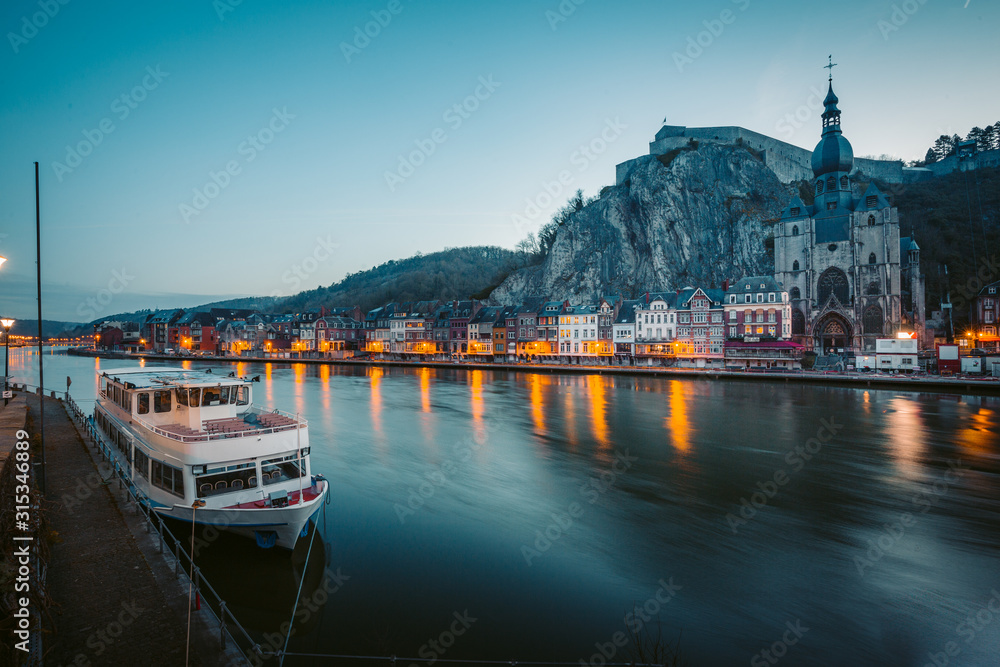 Fototapeta premium Historic town of Dinant with river Meuse at night, Wallonia, Belgium