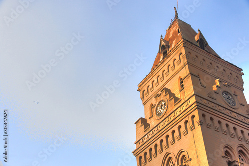 historic tower with clock in karachi photo