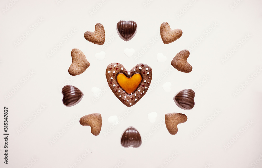 Fototapeta premium Flying heart shape cookies isolated Valentine Day
