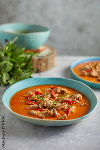 Dried red pork coconut curry, Thai cuisine.