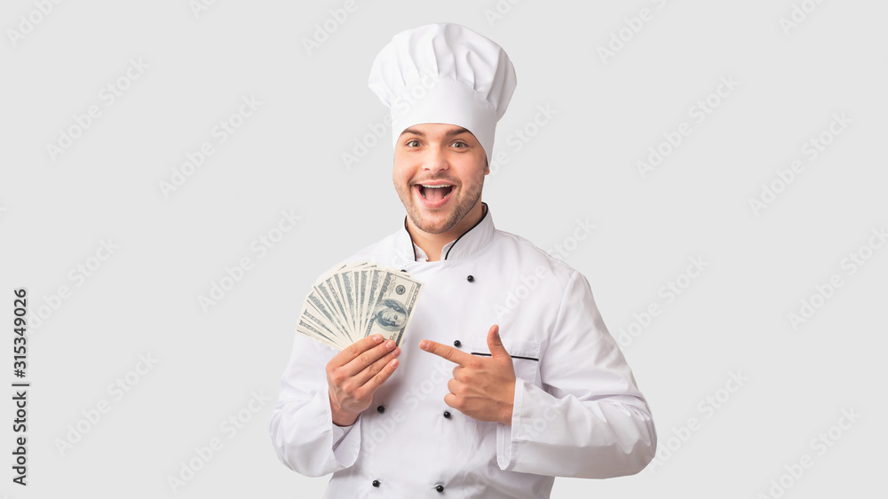 Chef Man Holding Money Pointing Finger Standing Over White Background Chef Man Holding Money Pointing Finger Standing Over White Background