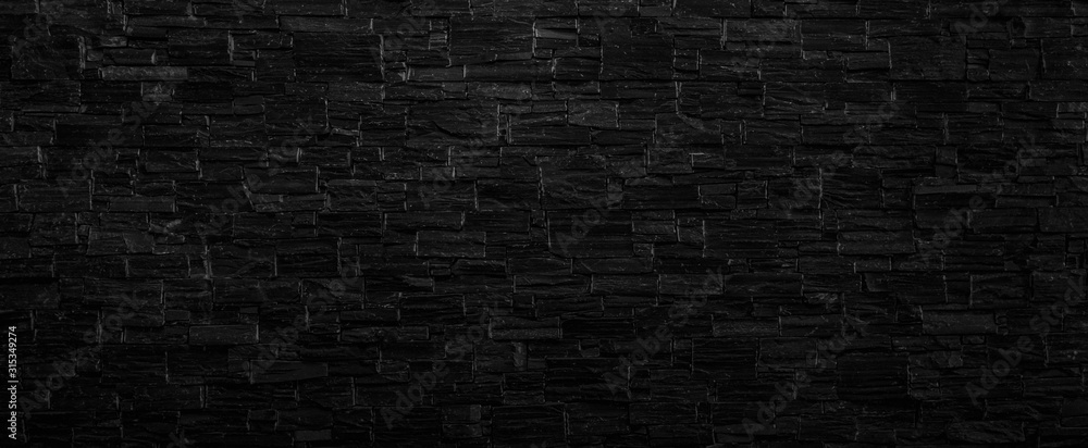 Fototapeta Old black brick wall texture background,brick wall texture for for interior or exterior design backdrop,vintage dark tone.