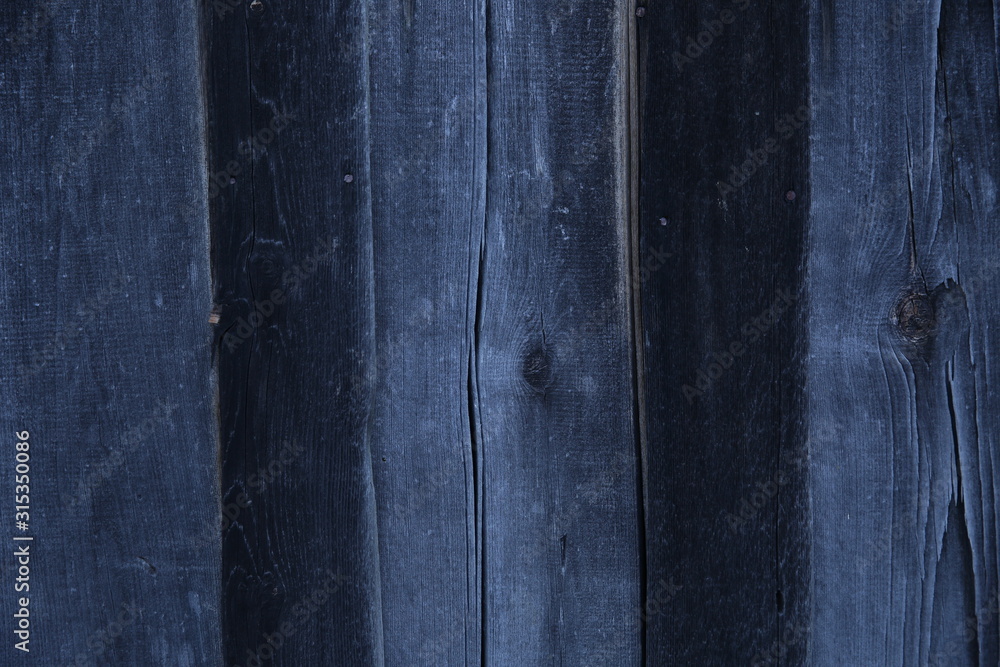 Naklejka premium Old weathered wood texture background pattern. Grey and black color panels. Copy space for text.