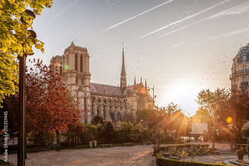 Paris, Notre Dame cathedral with spring trees in France © Tomas Marek