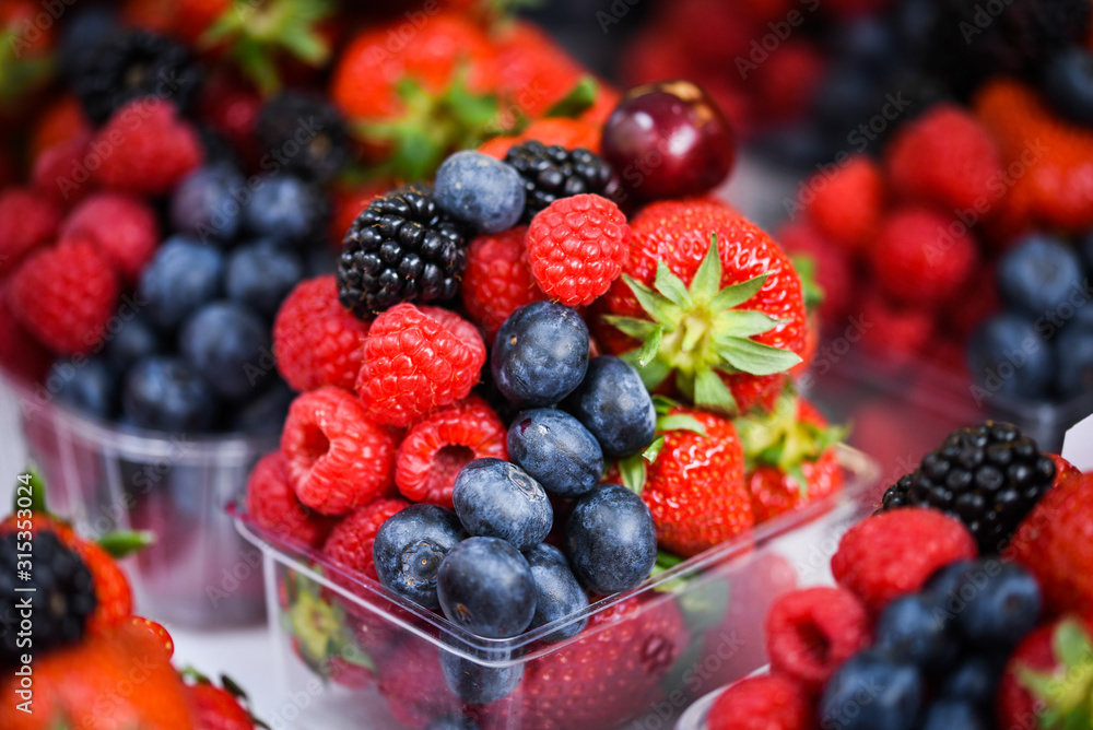 fresh berries close up - strawberries, blueberries, red berries, raspberry, black berries fresh berries close up - strawberries, blueberries, red berries, raspberry, black berries