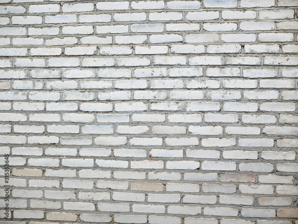 White brick wall closeup. Background of bricks. Background texture. White brick wall closeup. Background of bricks. Background texture.