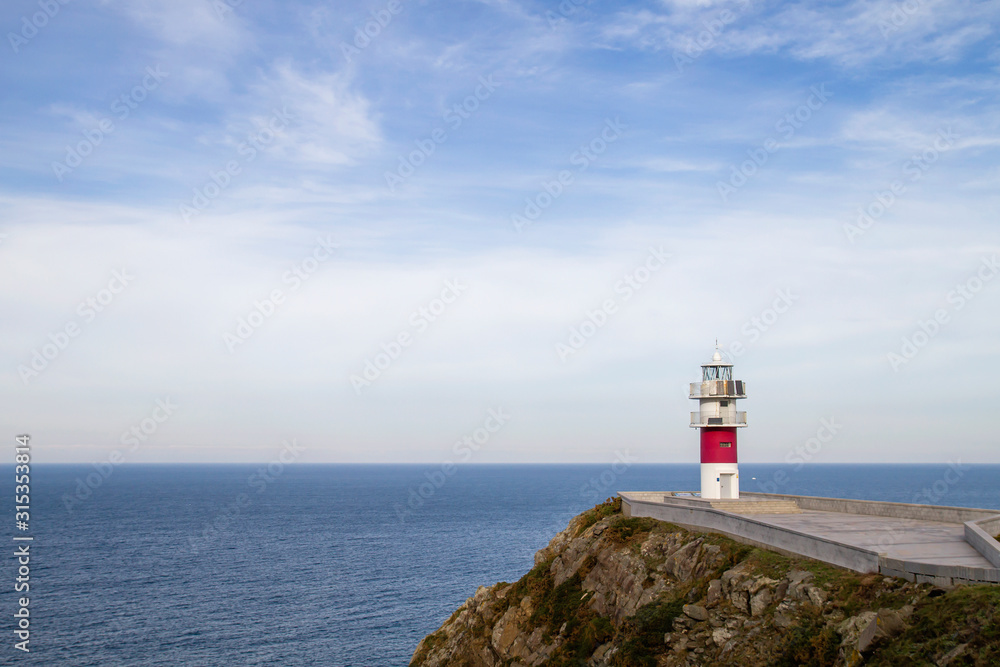 Lighthouse and atlantic ocean in Ortegal Cape, Galicia, Spain Lighthouse and atlantic ocean in Ortegal Cape, Galicia, Spain