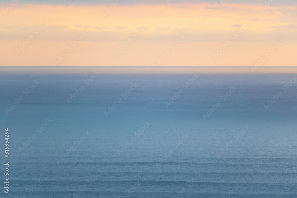 Aerial view of Tasman sea in sunset light