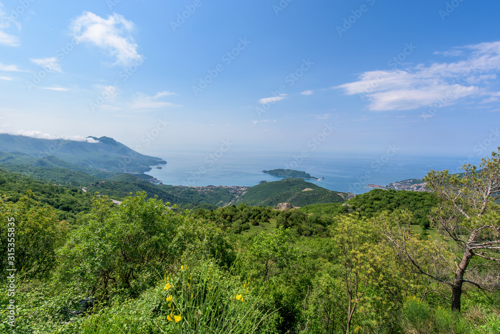 Adriatic sea, coast. summer beach holidays. mountainous terrain, rocks on the beach