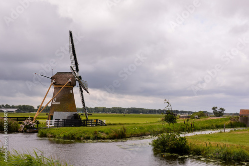 Classic Vintage Windmill in Holland photo