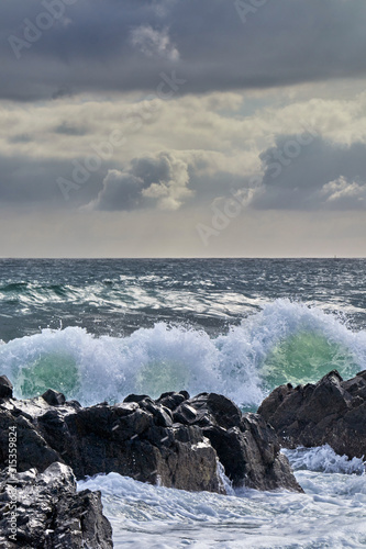 Strong waves in the sea hitting the rocks of the coast