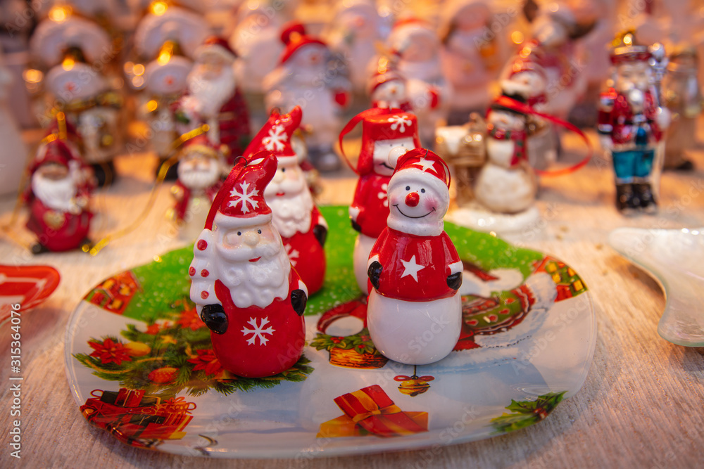 chiristmas decoration of Santa Claus and Snowman on christmas market