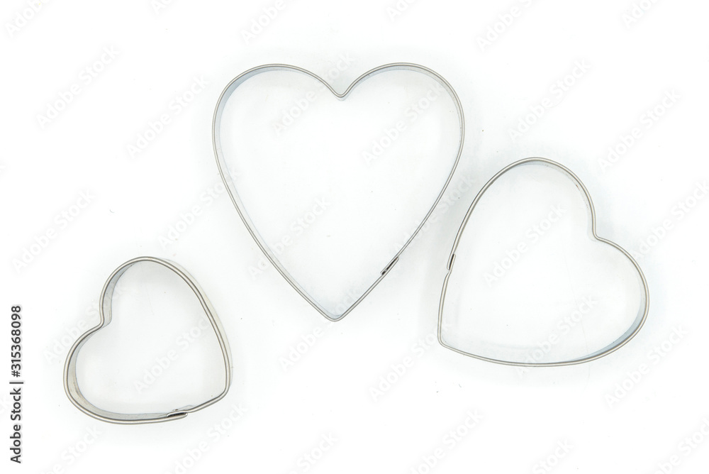 Heart shaped mold for cookies and biscuits on white background Heart shaped mold for cookies and biscuits on white background