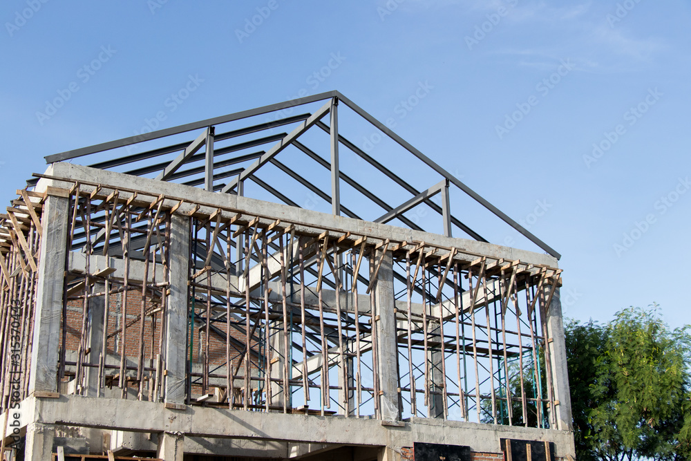 Structure of house wait for complete builidng with blue sky background
