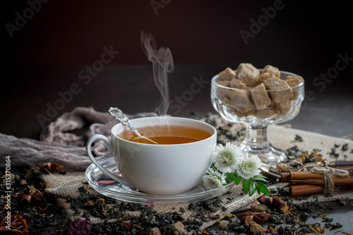 Tea in a cup on an old background