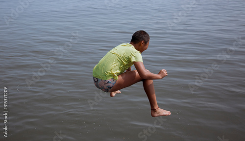 People diving by the Yalu River photo