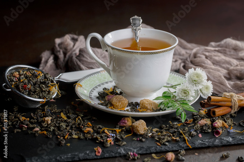 Tea in a cup on an old background