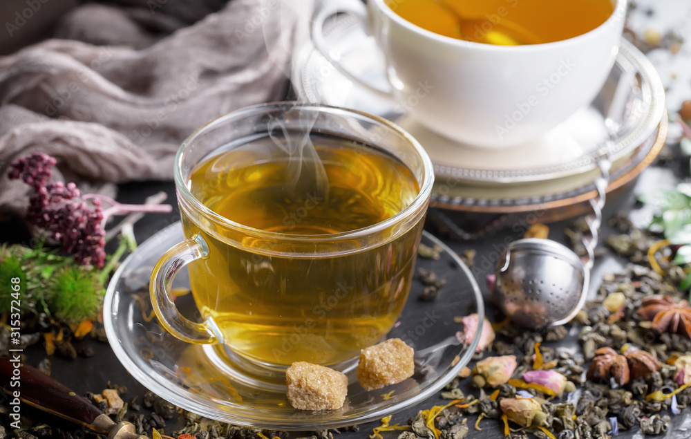 Tea in a cup on an old background Tea in a cup on an old background