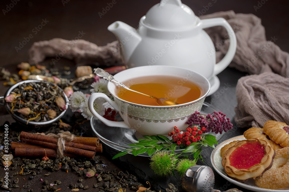 Tea in a cup on an old background Tea in a cup on an old background