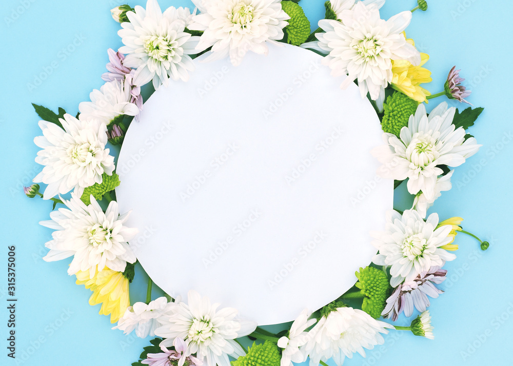 Spring flower arrangement on a blue background.