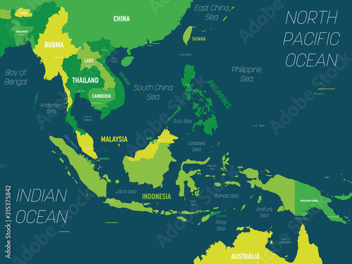 Southeast Asia map - green hue colored on dark background. High detailed political map of southeastern region with country, capital, ocean and sea names labeling