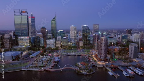 Smooth 4K drone footage of Perth Australia CBD at dusk