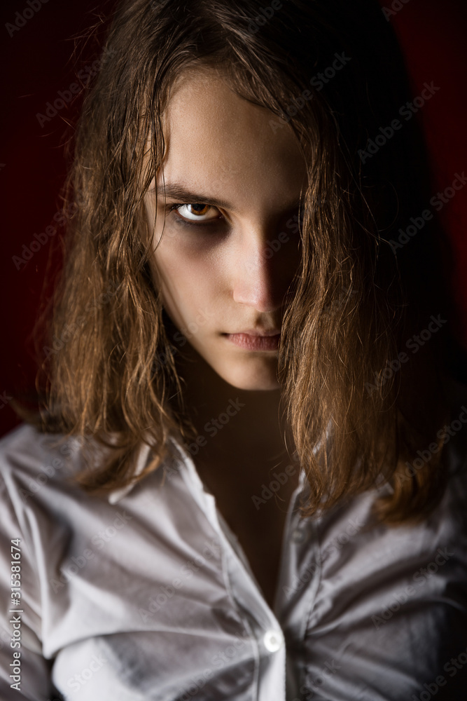 Horror style girl portrait. Evil girl.
