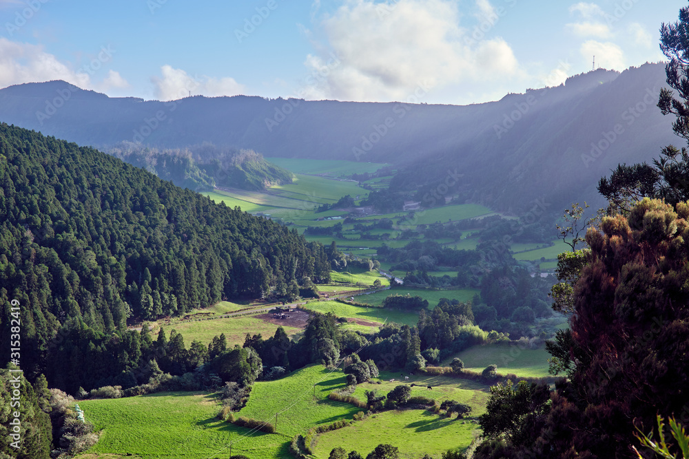 Mountain landscape with fields and forests on the Sao Miguel Island. Azores, Portugal.