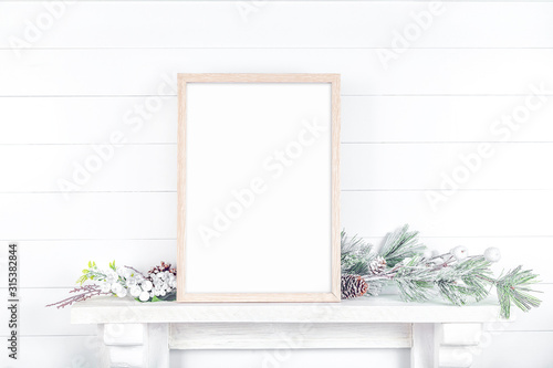 Layout of the frame on a light background with a pine branch photo