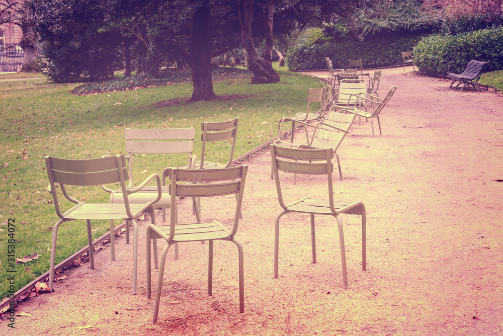 Empty metallic chairs in the Jardin du Luxembourg (Luxembourg gardens) in Paris, France