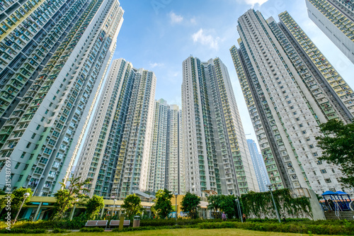 huge residential building complex, green court betweern high-rise apartment buildings photo