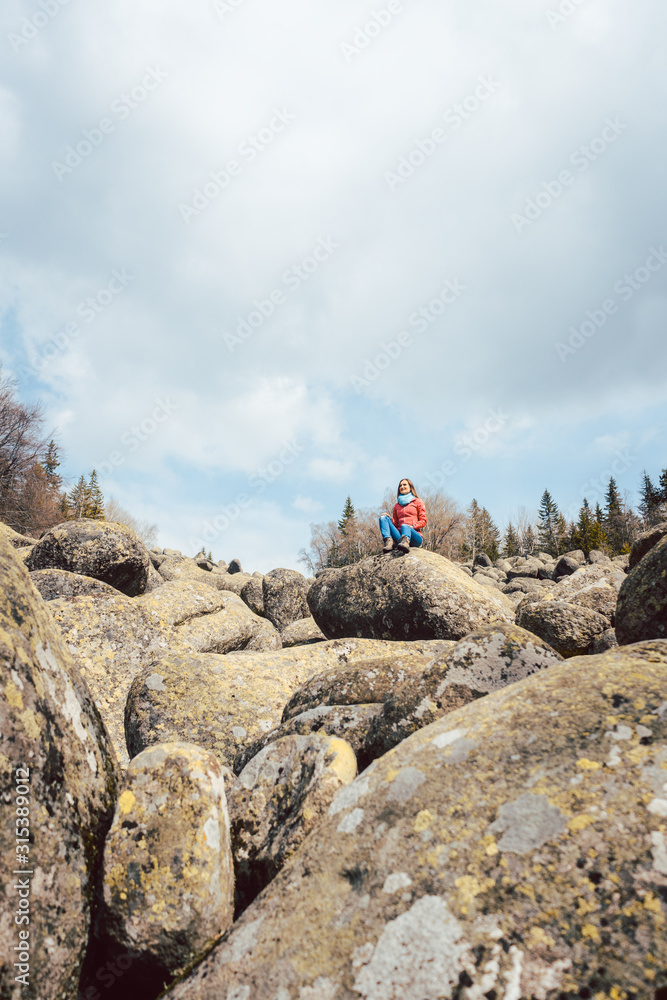 Woman hiking in a wild landscape