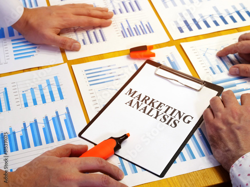 Marketing analysis market report on the desk.