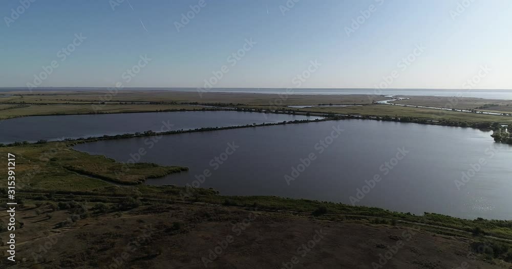 Aerial view of lakes for fish farming. Top view of Fish hatchery pond Aerial view of lakes for fish farming. Top view of Fish hatchery pond