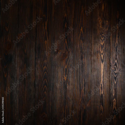 Wooden rustic textured dark background.Top view. Copyspace.