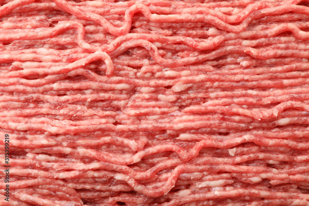 Tasty minced meat texture background, close up Tasty minced meat texture background, close up