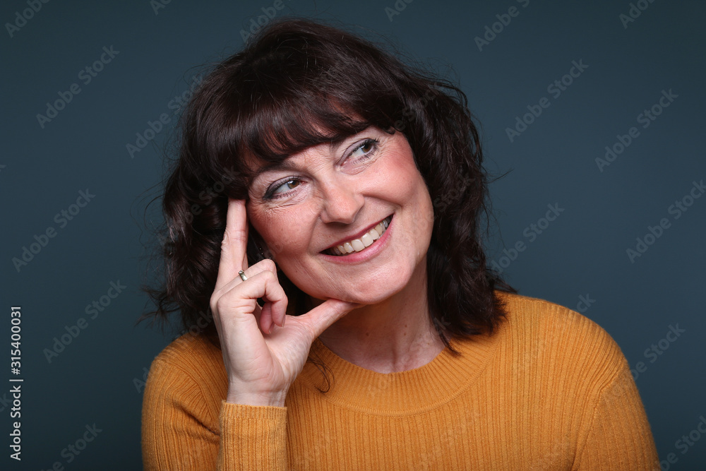 Beautiful woman in front of a background