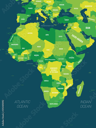 Africa map - green hue colored on dark background. High detailed political map of african continent with country, capital, ocean and sea names labeling