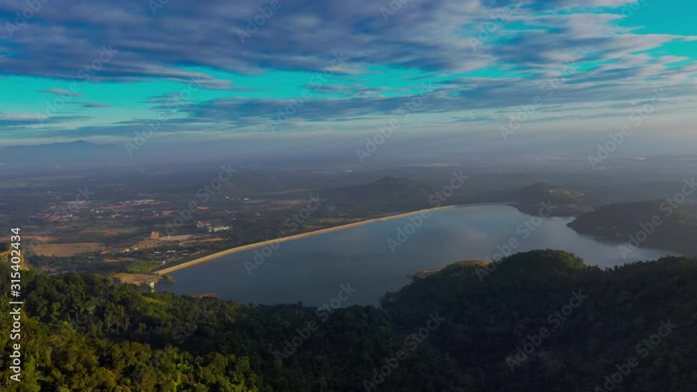 4k Aerial view of Bukit Mertajam Hills and Mengkuang Dam, during sunrise. Located at Bukit Mertajam, Penang. 4k Aerial view of Bukit Mertajam Hills and Mengkuang Dam, during sunrise. Located at Bukit Mertajam, Penang.