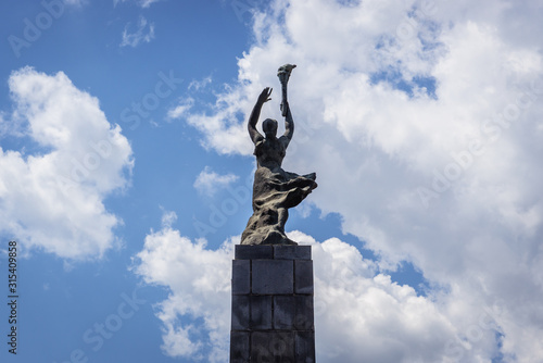 Memorial to Komsomol located on a Grigore Vieru Boulevard in Chisinau city, Moldova photo