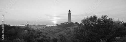 Leuchtturm auf Hiddensee mit Blick nach Rügen. 5.30Uhr morgens. Mit Körnung versehen.