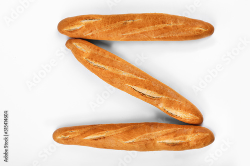 French baguette, bread. Isolated on white background