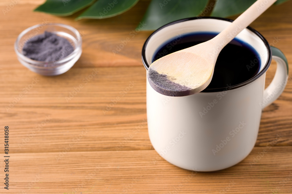 blue matcha tea on a wooden background. rustic concept. have copy space blue matcha tea on a wooden background. rustic concept. have copy space