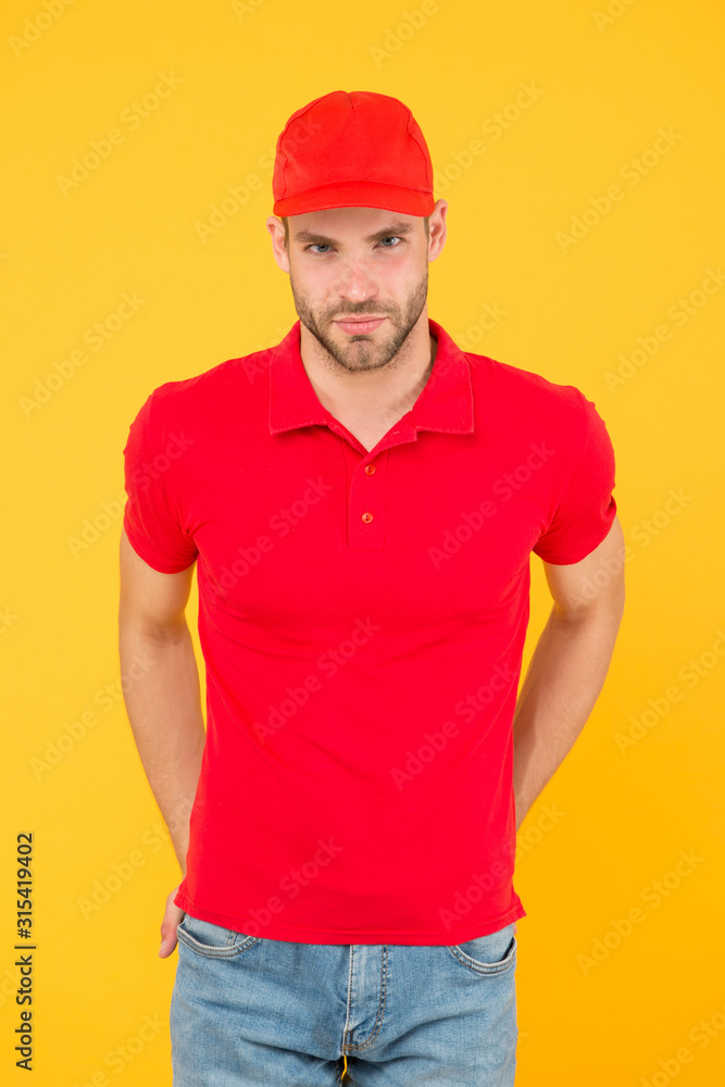 Already ready. Easing your business. Service delivery. Salesman and courier career. Courier and delivery service. Postman delivery worker. Man red cap yellow background. Delivering purchase Already ready. Easing your business. Service delivery. Salesman and courier career. Courier and delivery service. Postman delivery worker. Man red cap yellow background. Delivering purchase