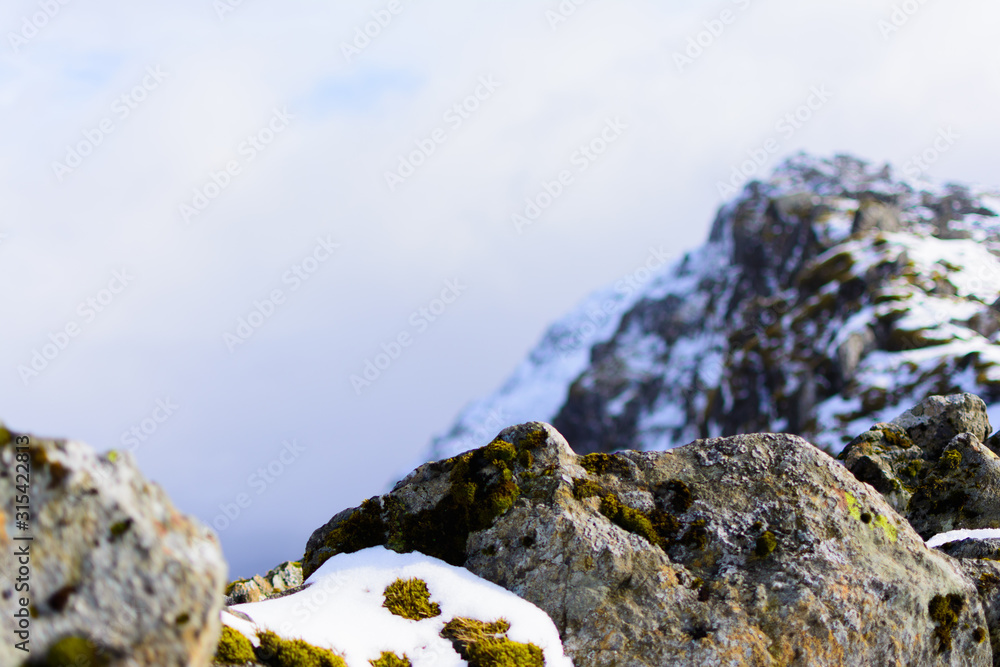 snow on rocks 