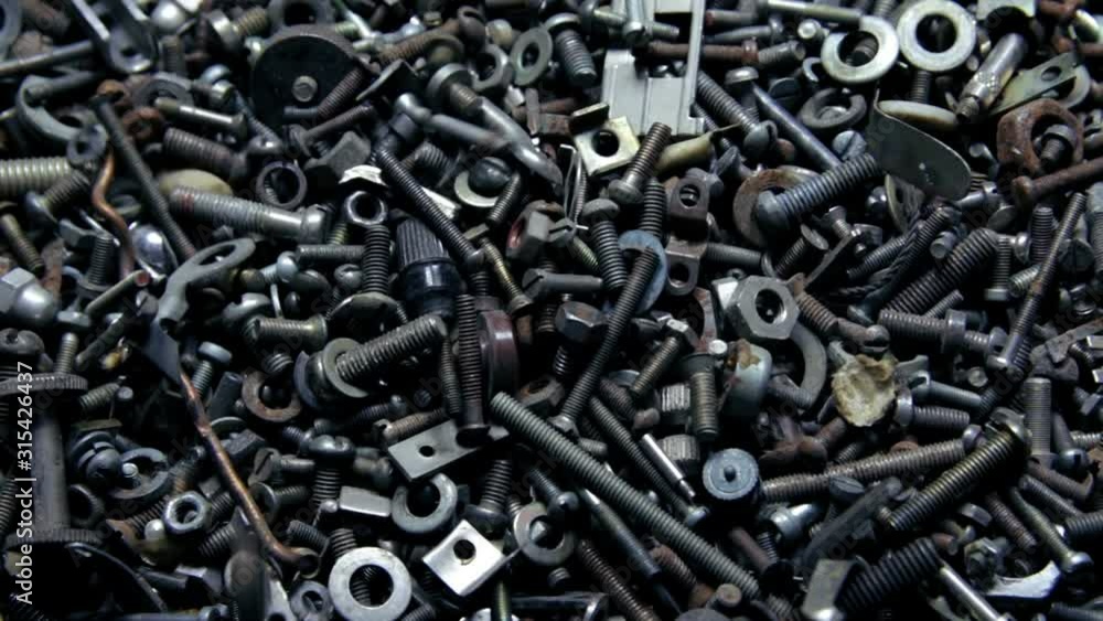 Background of bunch of old nuts bolts and nails Background of bunch of old nuts bolts and nails