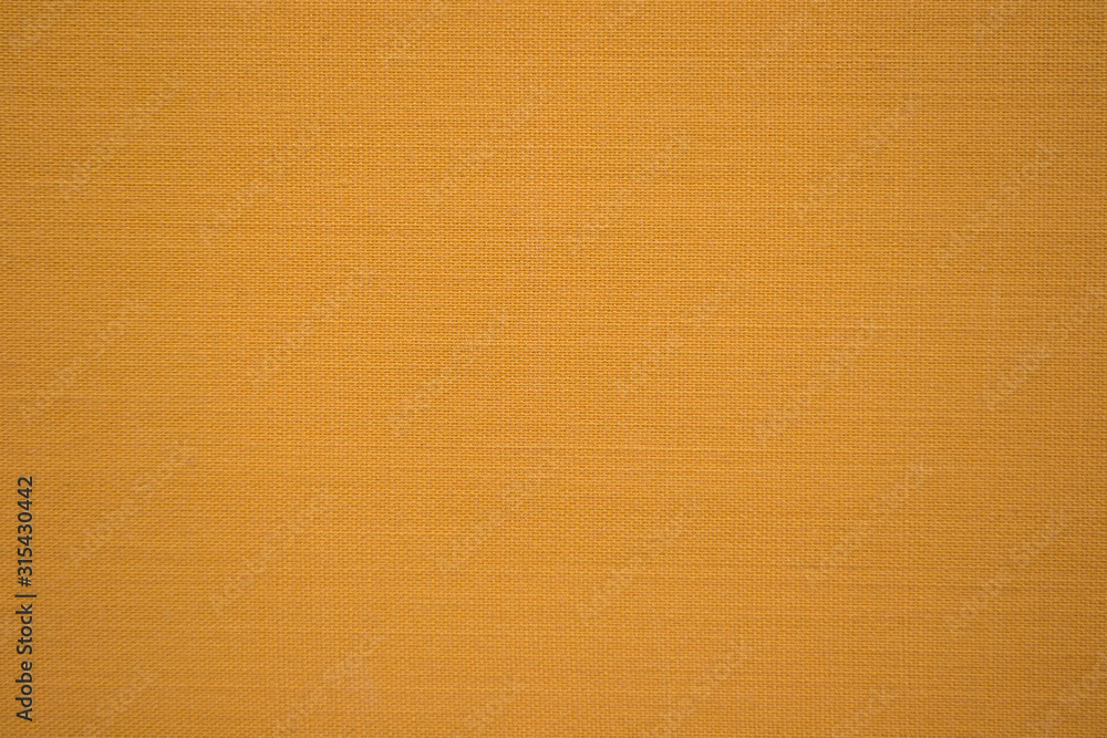 Fototapeta premium Natural fabric texture as background. Background from a textile material with wicker pattern, closeup.
